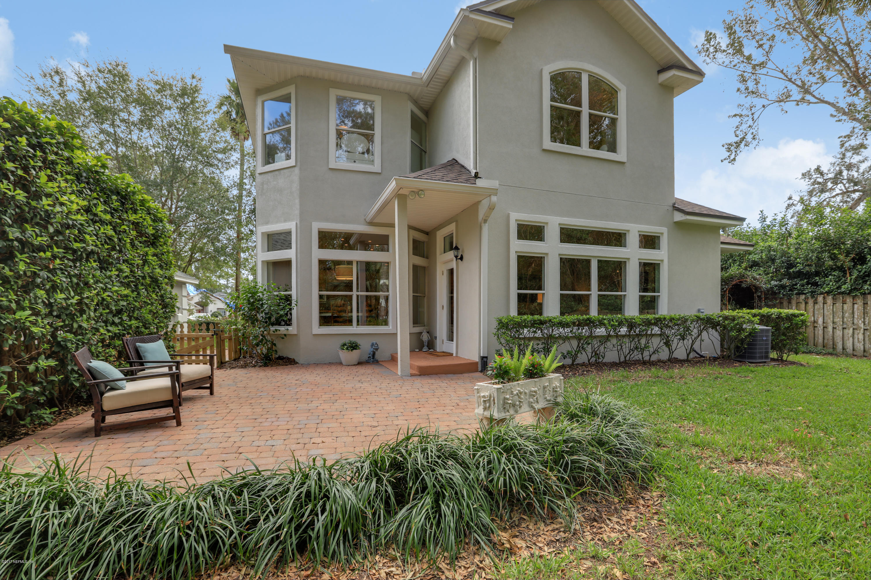 489 Big Tree Road Ponte Vedra Beach, FL 32082 - Photo 26 of 32 front view of a house with a garden
