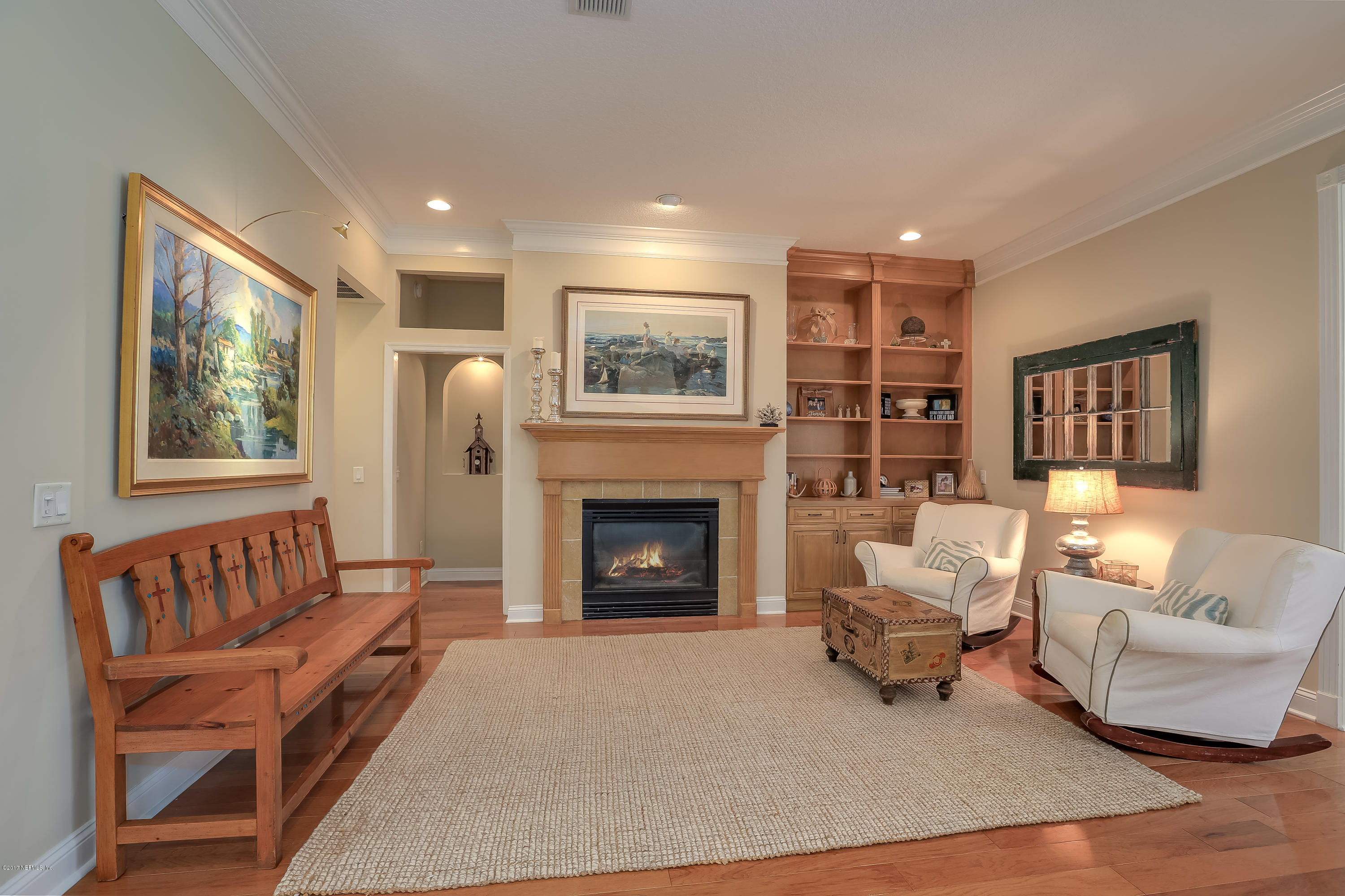 489 Big Tree Road Ponte Vedra Beach, FL 32082 - Photo 6 of 32 a living room with furniture and a fireplace