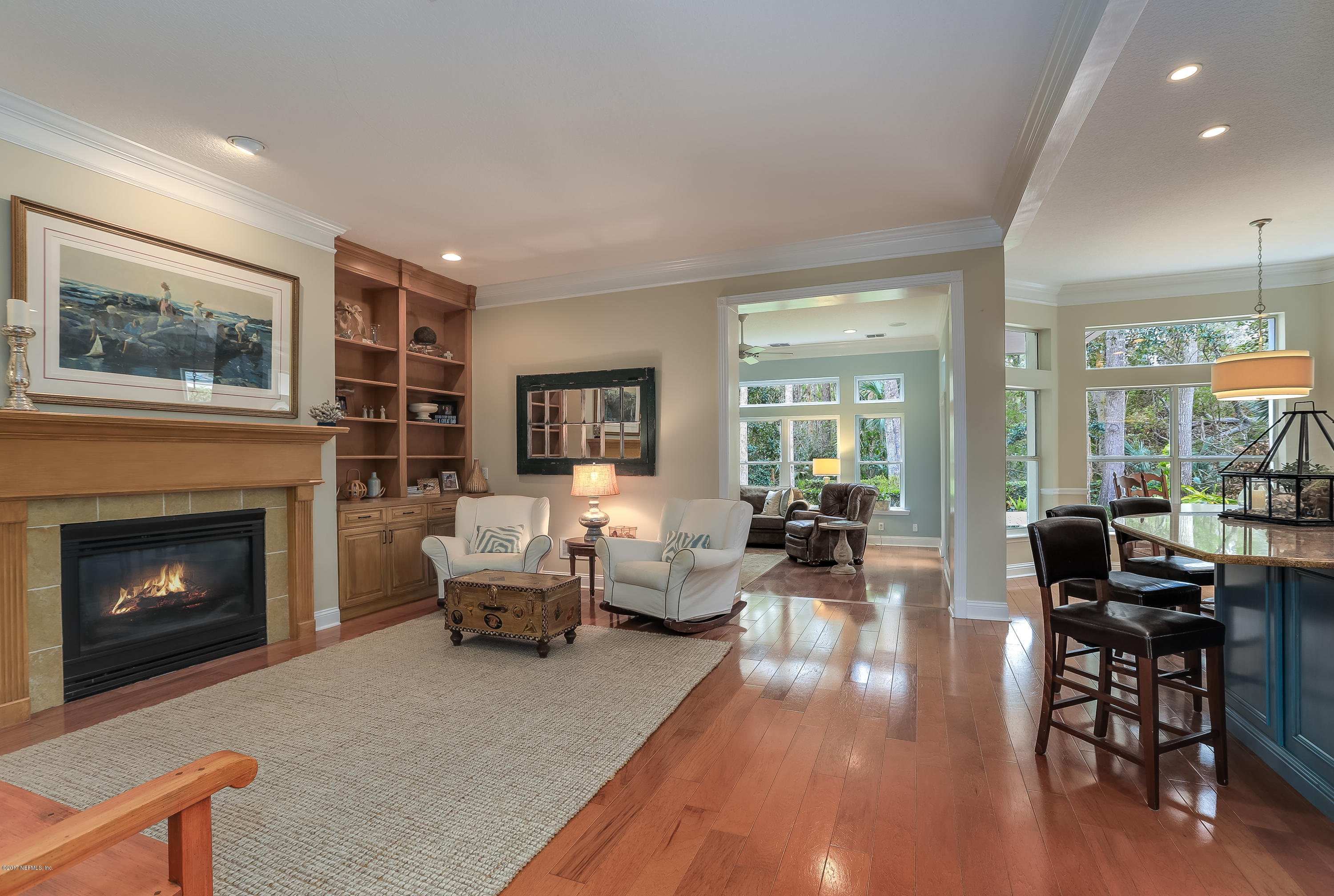 489 Big Tree Road Ponte Vedra Beach, FL 32082 - Photo 7 of 32 a living room with furniture and a fireplace
