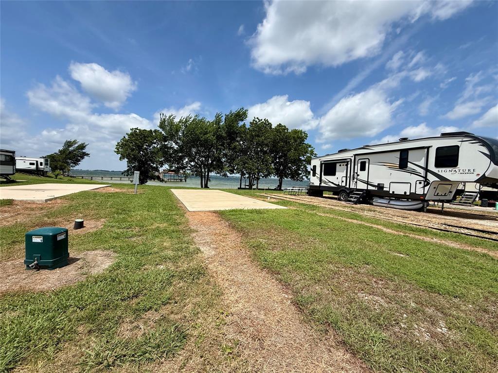 5136 Peninsula Road Kerens, TX 75144 - Photo 20 of 40 Improved lot with pad, utilities available, and shade.