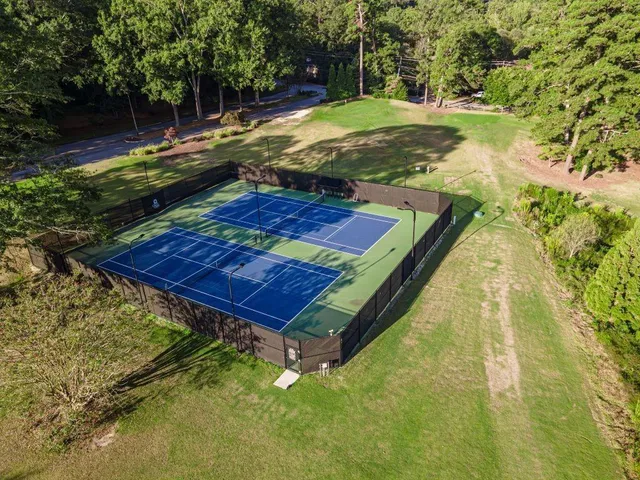 a view of a backyard with a yard