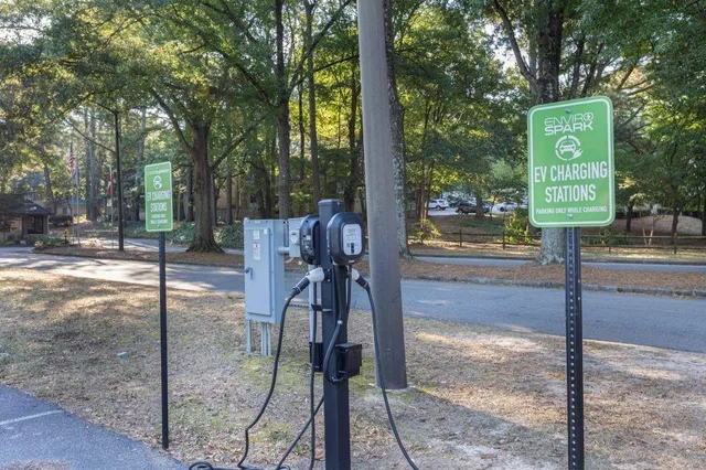 a sign board with yard