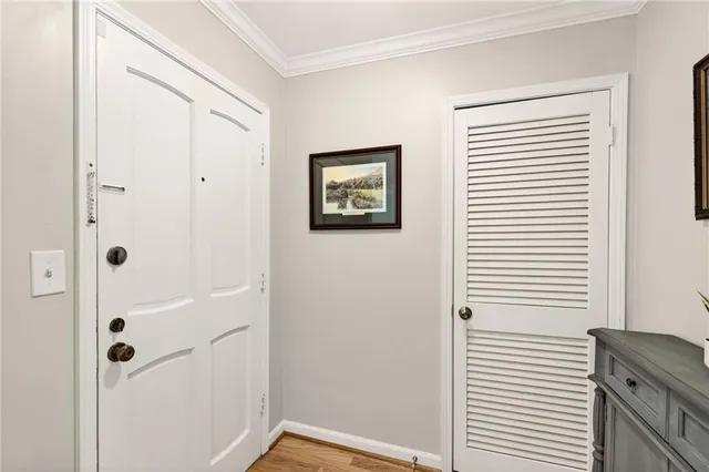 a view of a hallway with closet