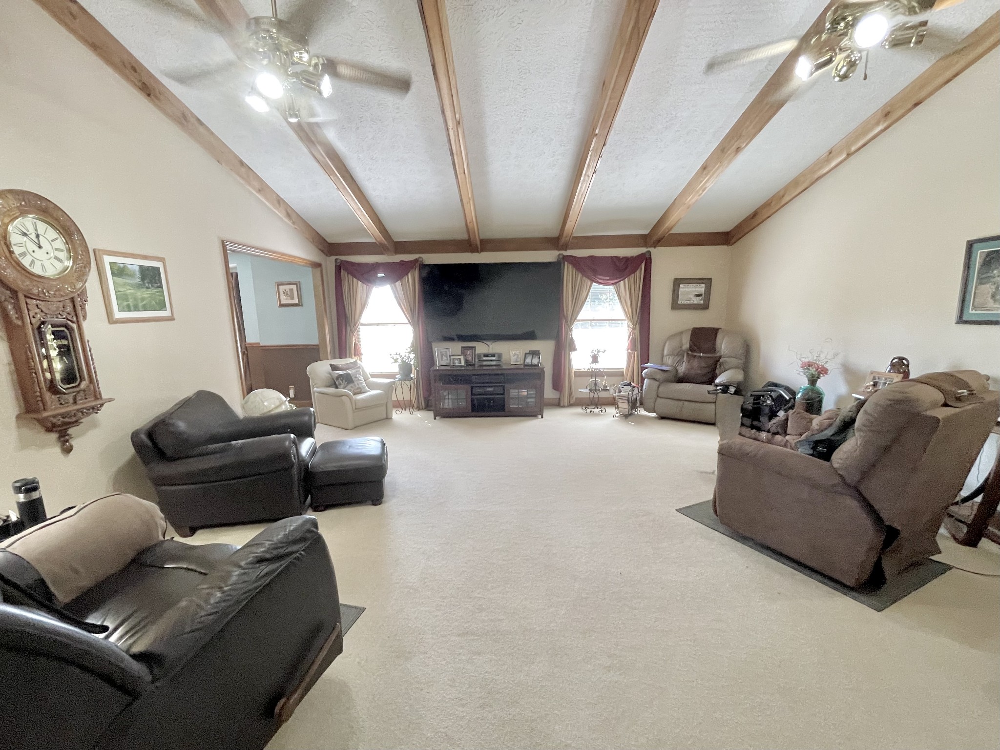6914 Burkitt Road Antioch, TN 37013 - Photo 25 of 97 a living room with furniture and a chandelier