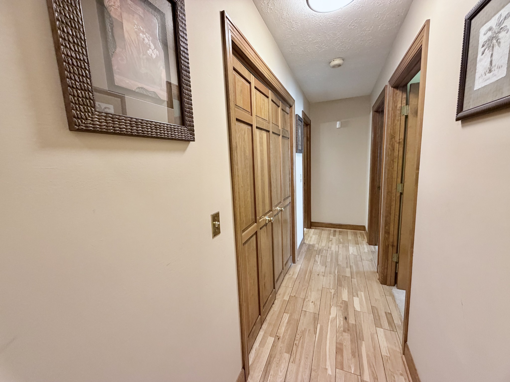 6914 Burkitt Road Antioch, TN 37013 - Photo 42 of 97 a view of a hallway with wooden floor and staircase