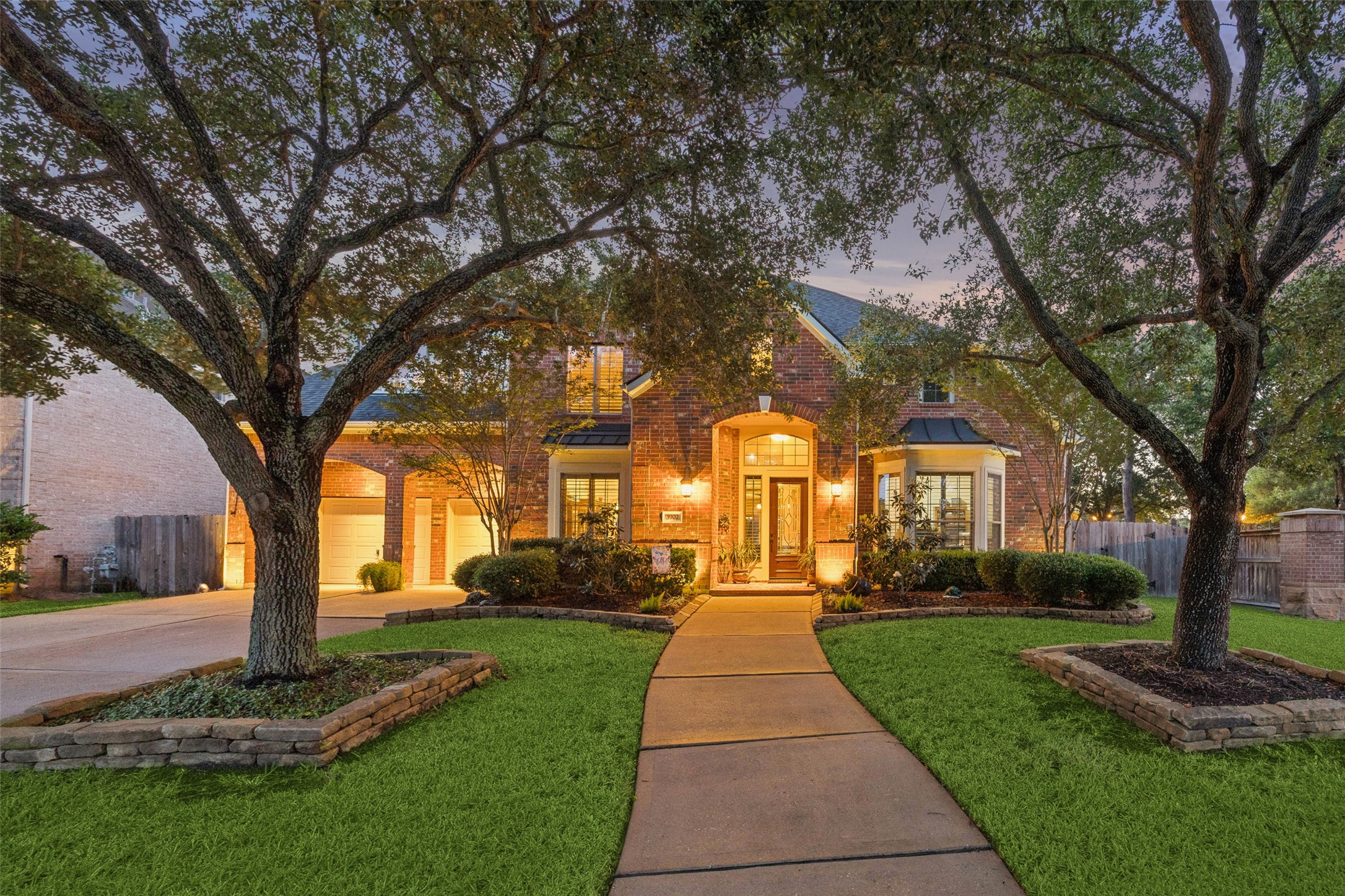 3902 Trailstone Lane Katy, TX 77494 - Photo 1 of 50 Stunning Trendmaker home holds all the cards, & it's not showing its full hand just yet. On a nearly 1/4-acre corner lot in Grand Lakes, this 5-bedroom, 4.5-bath home draws you in with impressive open living spaces & a layout that keeps revealing more the farther you go. Then come the surprises: saltwater pool & spa, upper & lower covered poolside patios, a 3-car garage with a workshop. Zoned to Katy ISD & close to parks, pools, and more this is the kind of home you'll never want to leave.