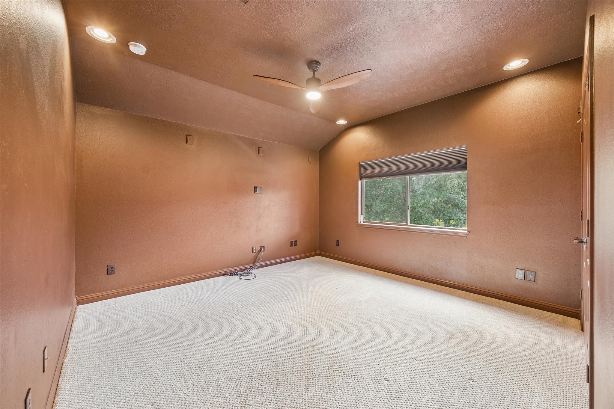 3902 Trailstone Lane Katy, TX 77494 - Photo 28 of 50 Get the popcorn! It's movie time. This fabulous media room is ready for action with upgraded carpet, designer paint, a raised ceiling with recessed lights and a cooling fan, and plenty of floor space for theater style seating.