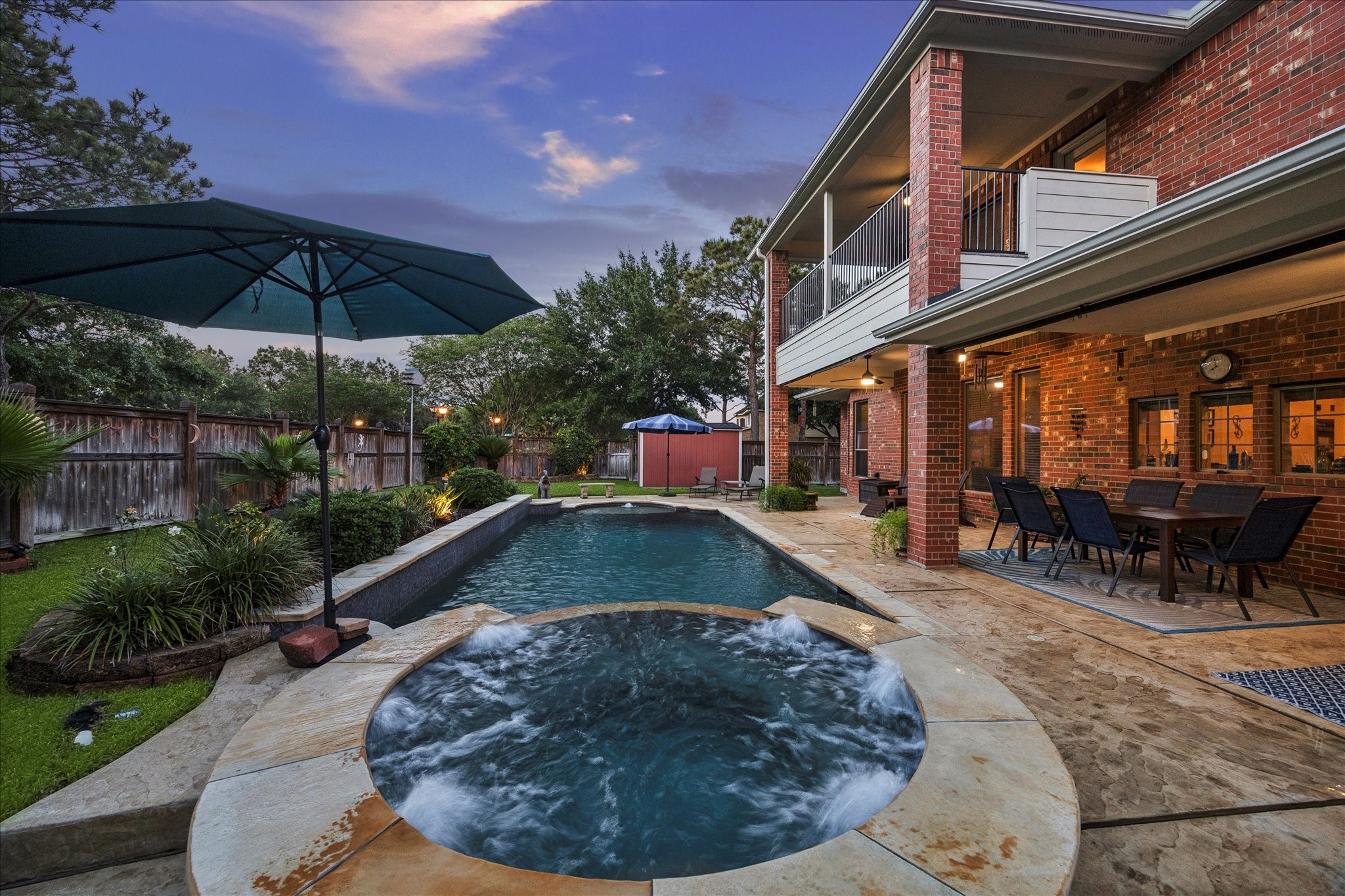 3902 Trailstone Lane Katy, TX 77494 - Photo 39 of 50 As the sun goes down, this saltwater pool and spa step into their spotlight, creating a backyard scene that feels equal parts peaceful and unforgettable. Evening swims, late-night soaks, and conversations under the stars are all on the agenda here.