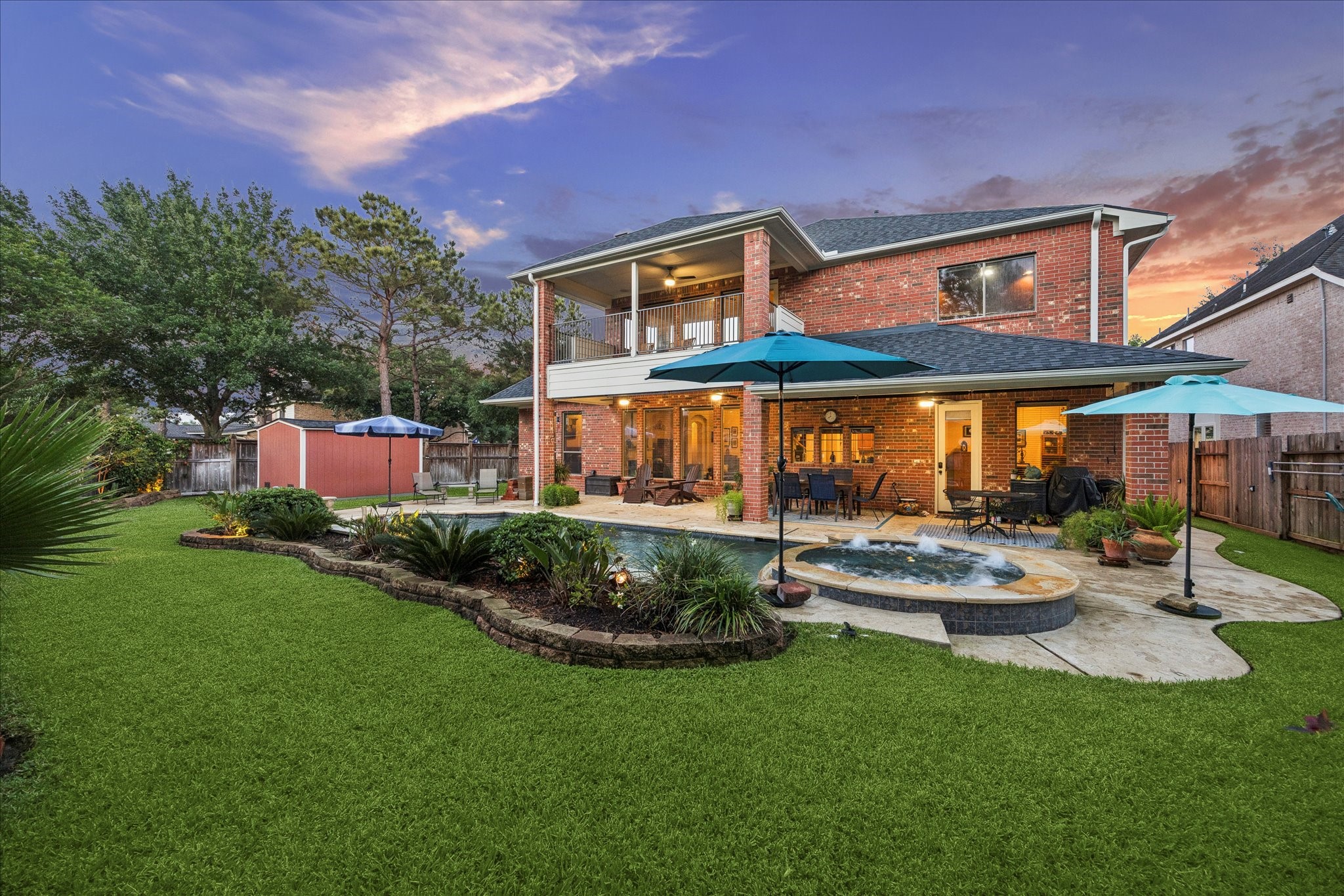3902 Trailstone Lane Katy, TX 77494 - Photo 40 of 50 Spend sunny afternoons stretched out on your favorite pool float. Then as dusk settles in, watch this space transform into the kind of backyard oasis that makes you want to linger a little longer, with the pool shimmering, the spa warming up, and the night is just getting started.