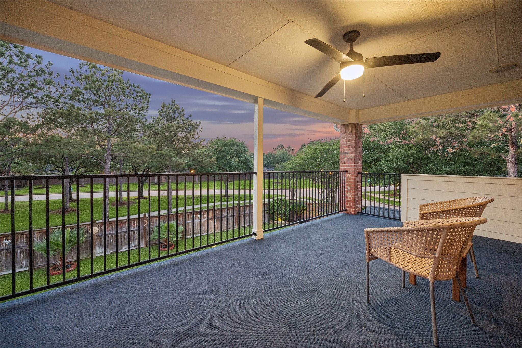 3902 Trailstone Lane Katy, TX 77494 - Photo 41 of 50 Let the party flow from inside to out. This expansive covered balcony off the game room is where you can kick back with a drink, catch up with friends, and enjoy views of the pool and spa below with the greenbelt stretching behind the home.