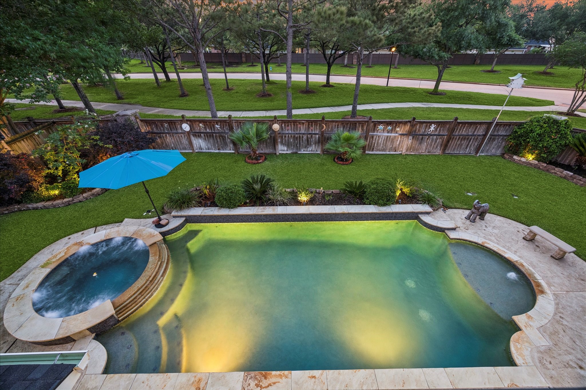 3902 Trailstone Lane Katy, TX 77494 - Photo 42 of 50 This is the kind of space everyone will want to claim. When it’s time for a little fresh air, you’ll enjoy this covered balcony overlooking the sparkling pool and spa below and the peaceful greenbelt behind the home.