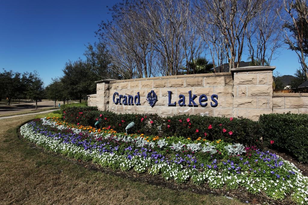 3902 Trailstone Lane Katy, TX 77494 - Photo 46 of 50 Living in Grand Lakes means having resort-style pools and splash pads, tennis courts, a dog park, playgrounds, picnic areas, scenic lakes, and miles of walking and biking trails right in the neighborhood. Whether the day calls for outdoor adventure, family fun, or a quiet evening stroll, this beautifully planned Katy community makes it all feel close to home.