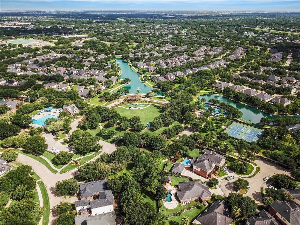 3902 Trailstone Lane Katy, TX 77494 - Photo 47 of 50 From above, it is easy to see what makes this setting so special, a beautifully established Grand Lakes community with scenic water, winding trails, resort-style amenities, and the kind of surroundings that make coming home feel like part of the lifestyle.