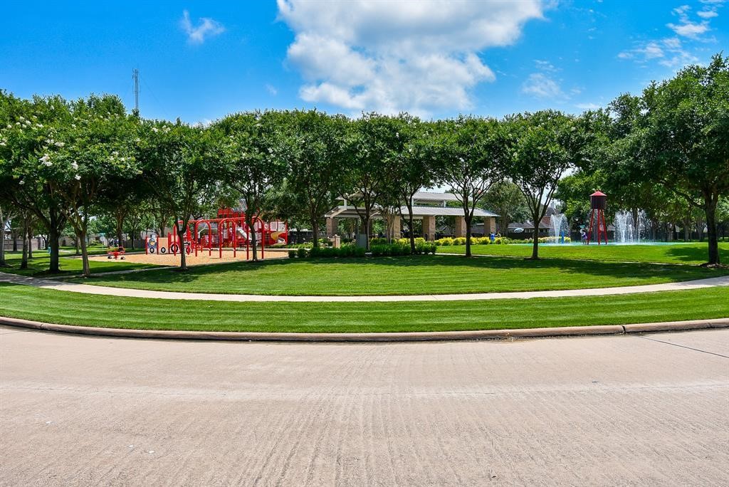 3902 Trailstone Lane Katy, TX 77494 - Photo 49 of 50 Scenic Lakebluff gazebo and winding trails create the perfect backdrop for morning walks, evening strolls, and quiet moments outdoors surrounded by the natural beauty of Grand Lakes.