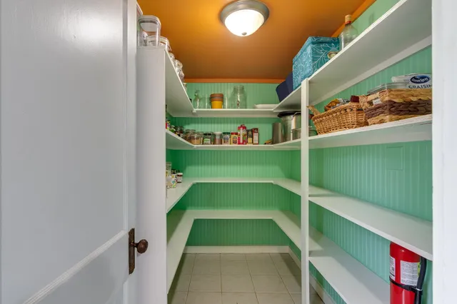 a view of entryway with a front door