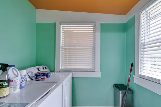 a view of a room that has a window in it