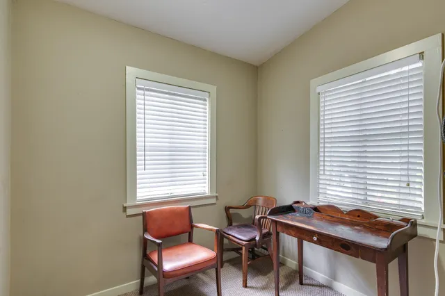 a room with a window and a table