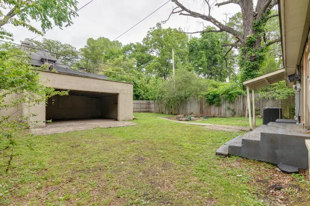 a view of a couches in backyard of house