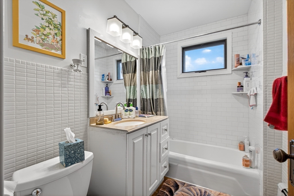 76-78 Lewis Road Belmont, MA 02478 - Photo 27 of 36 a bathroom with a sink a toilet and shower