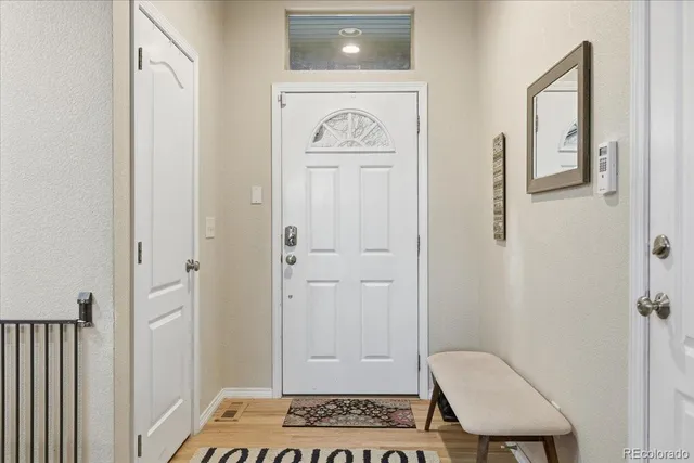 a view of a hallway with windows