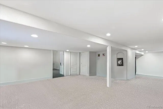 a bed room with a bed and a window