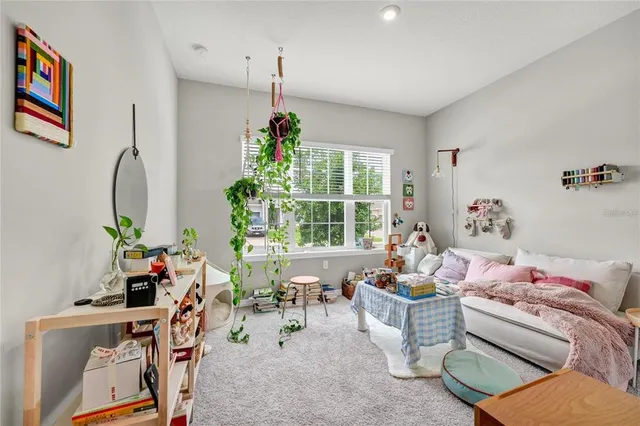 a workspace with furniture and a rug