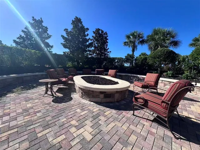 a view of a pathway with a wrought fence