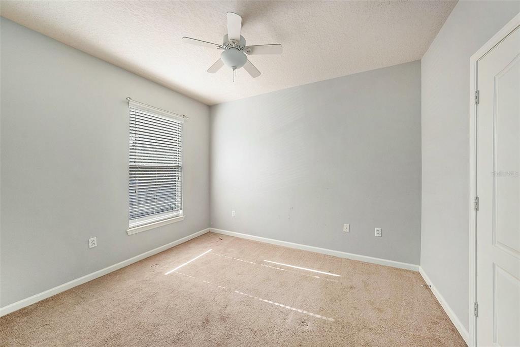10436 Villa View Circle Tampa, FL 33647 - Photo 11 of 18 an empty room with a window