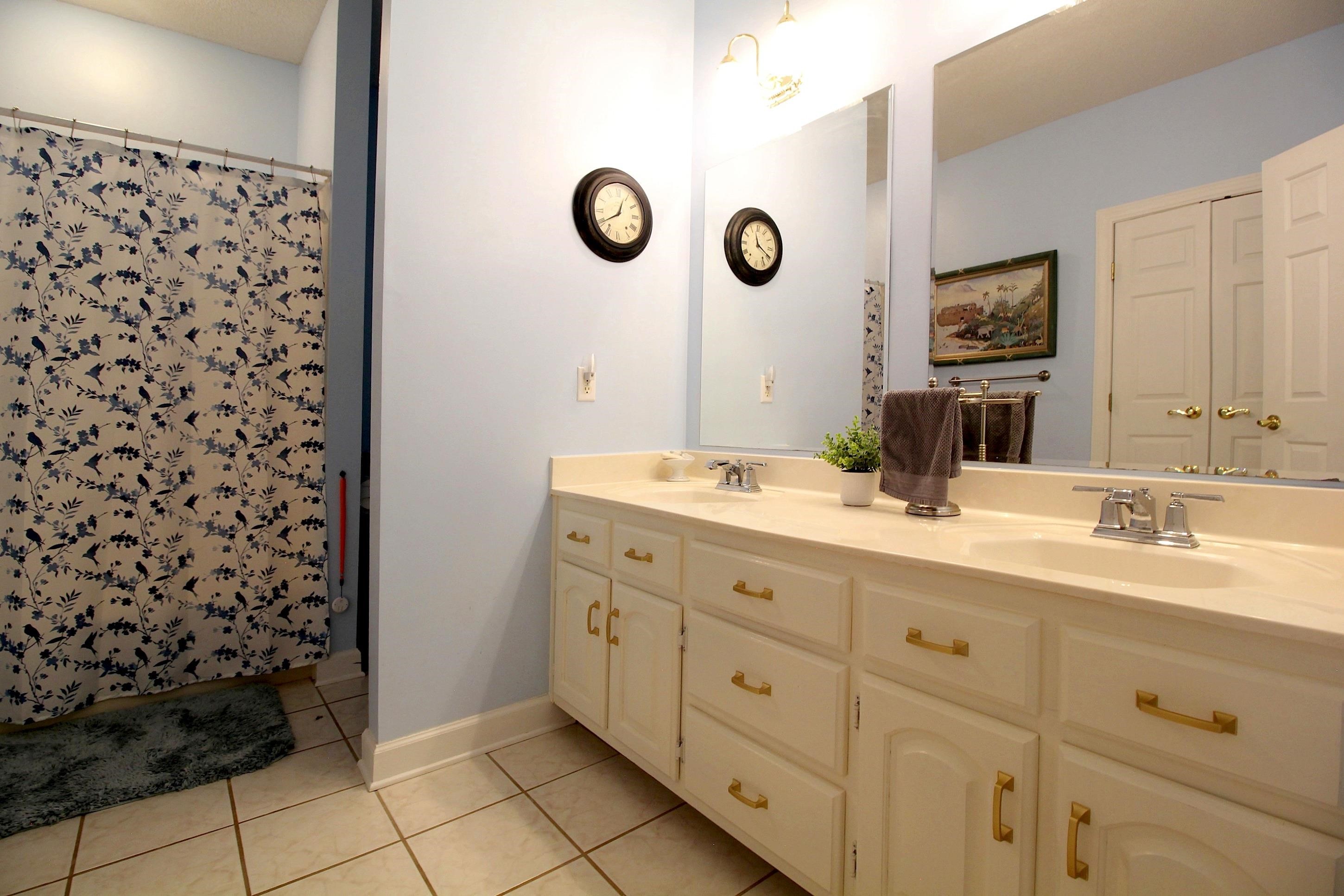 2550 North Reid Hooker Road Eads, TN 38028 - Photo 22 of 32 a bathroom with a sink and a mirror