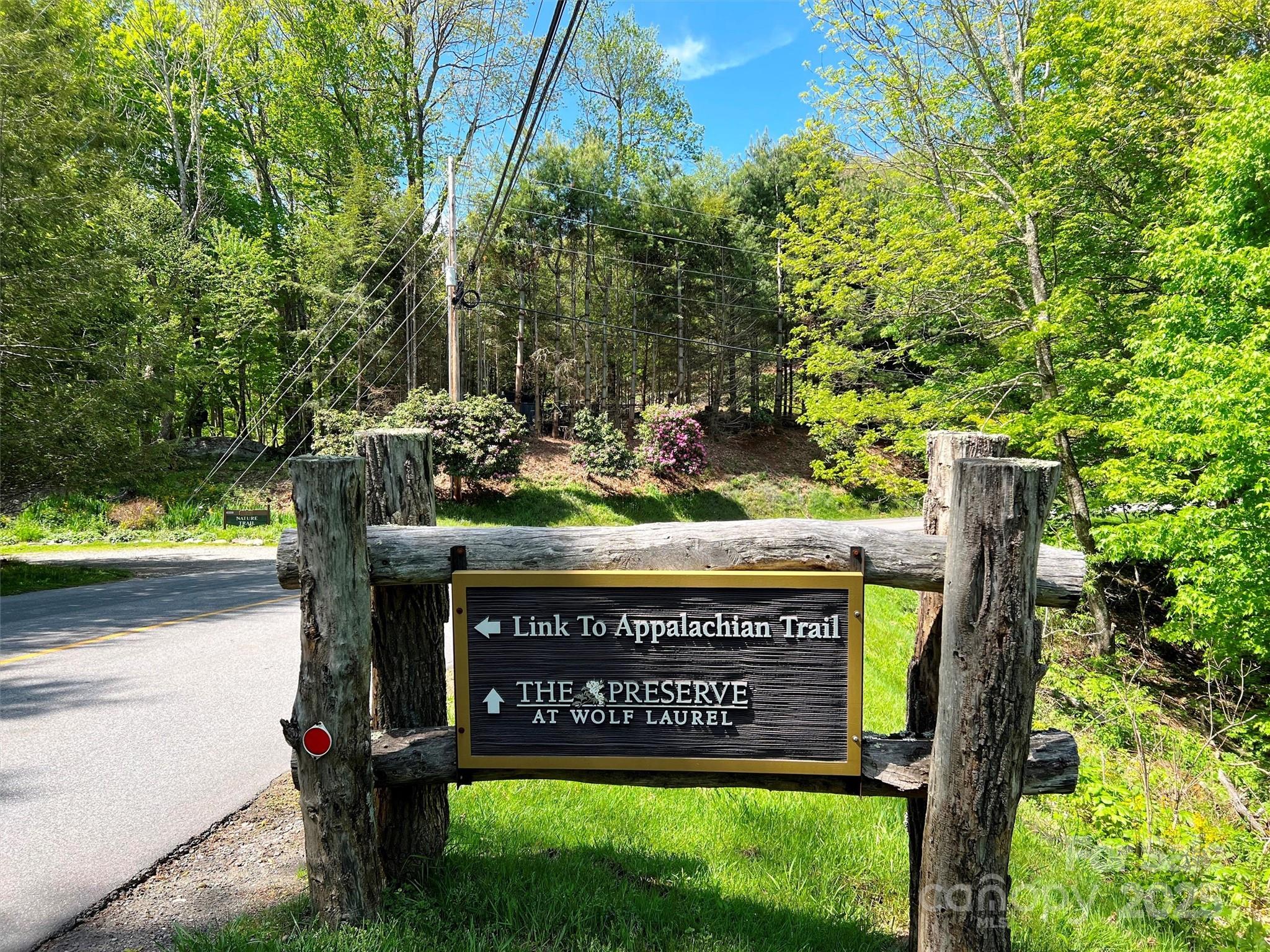 Tbd Goldenleaf Road, Unit 74 Mars Hill, NC 28754 - Photo 6 of 17 a sign on the side of the road