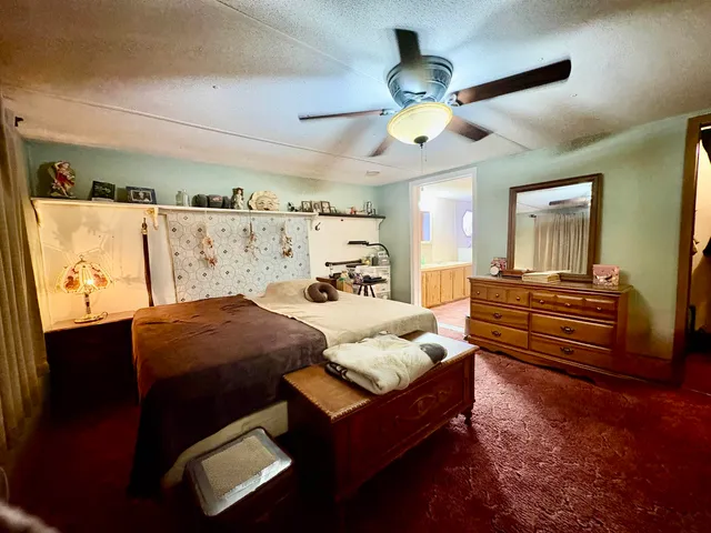 a bathroom with a double vanity sink mirror and toilet