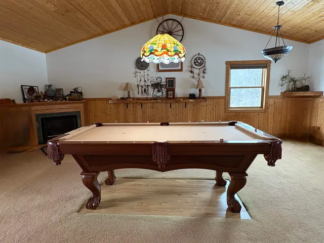 a living room with a fireplace