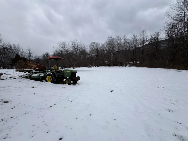 a view of balcony with wooden floor and outdoor seating