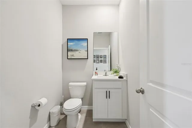 a view of a back yard from a lake view