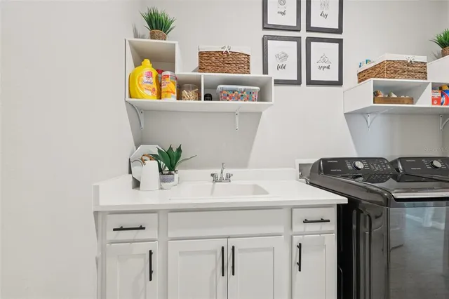 an aerial view of a city with lawn chairs