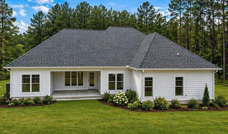 575 Hardy Road Martin, GA 30557 - Photo 5 of 16 a house that is sitting in the grass