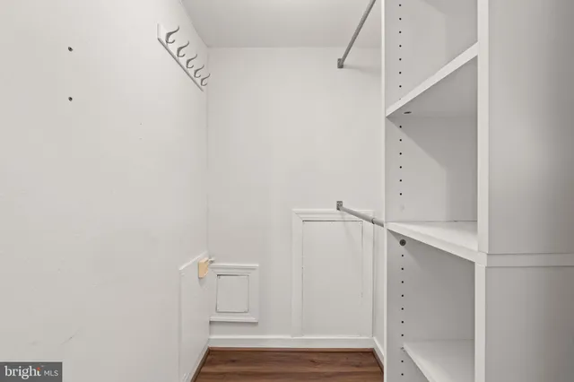a view of an empty walk in closet