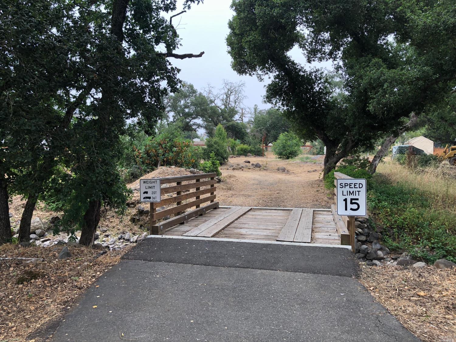 4228 Wallace Road Santa Rosa, CA 95404 - Photo 1 of 1 a view of a street with some trees