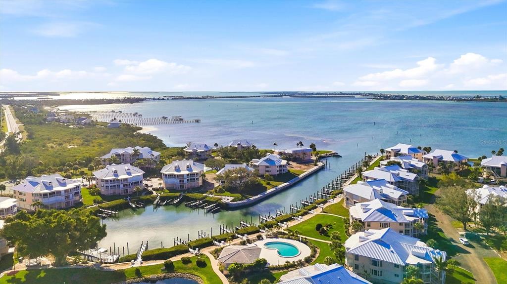 11000 Placida Road, Unit 302 Placida, FL 33946 - Photo 3 of 68 a view of an ocean and beach
