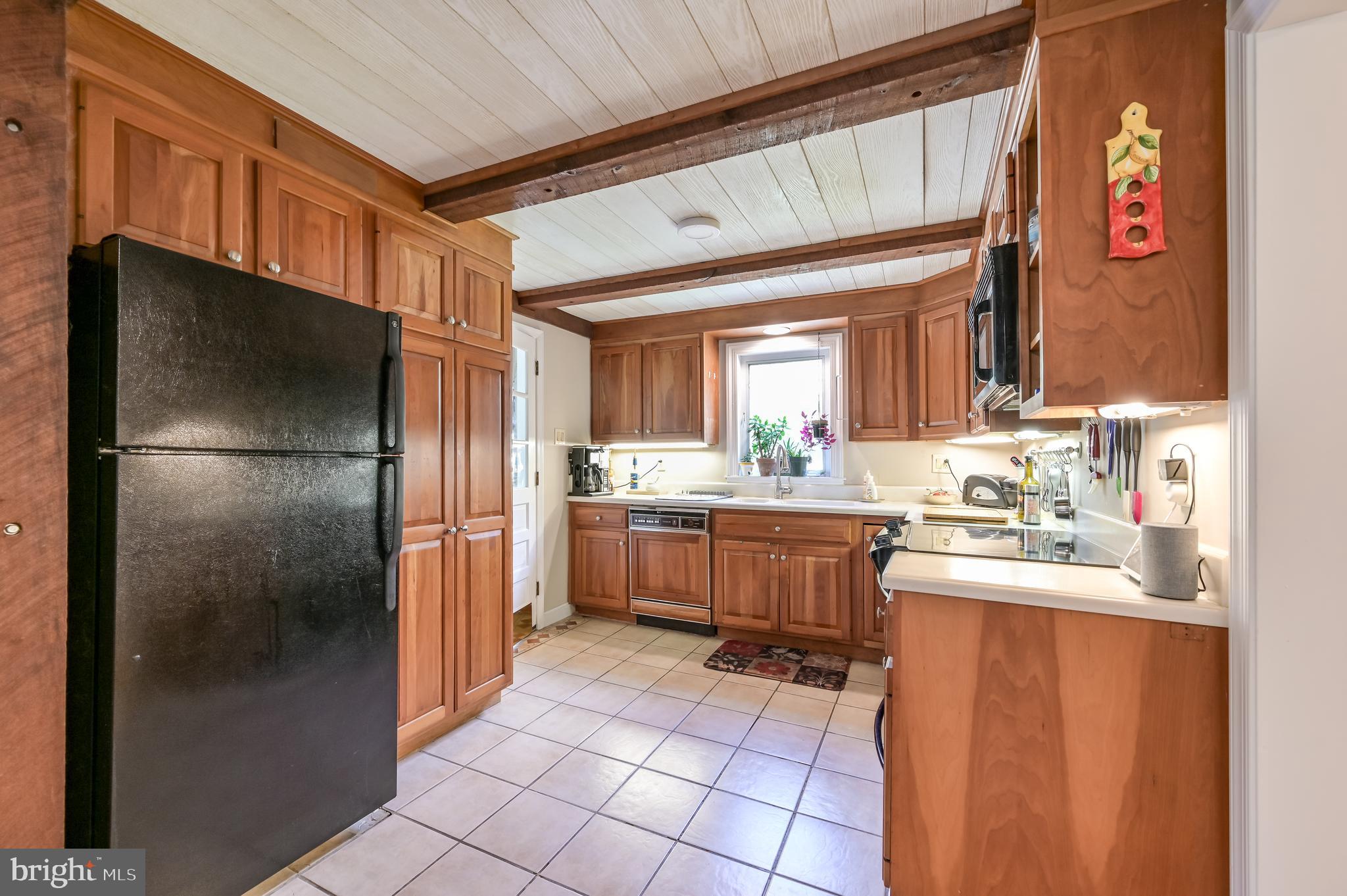 1746 Norristown Road Ambler, PA 19002 - Photo 15 of 40 Cherry Cabinets/Black Appliances