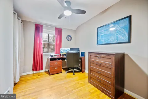 a bed room with a bed and furniture