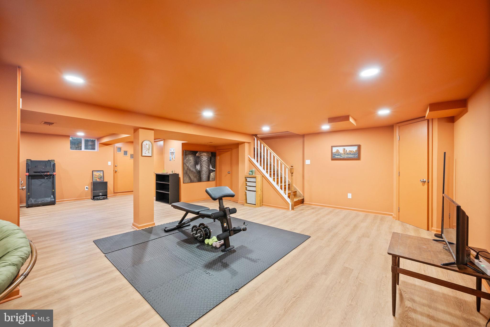 1311 Glenmont Road Baltimore, MD 21239 - Photo 27 of 49 Vibrant basement gym with ample space.