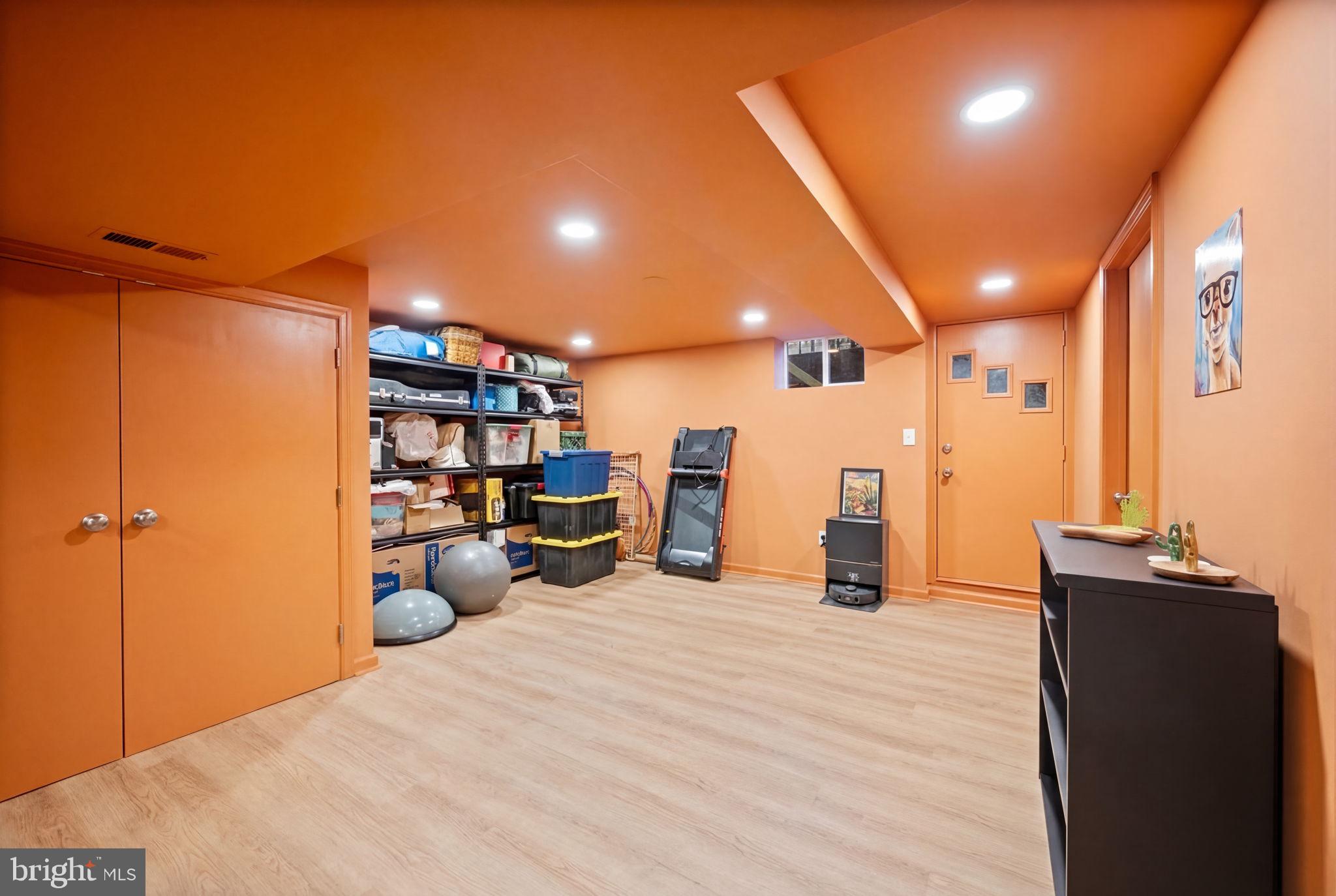 1311 Glenmont Road Baltimore, MD 21239 - Photo 28 of 49 Vibrant basement with ample storage.