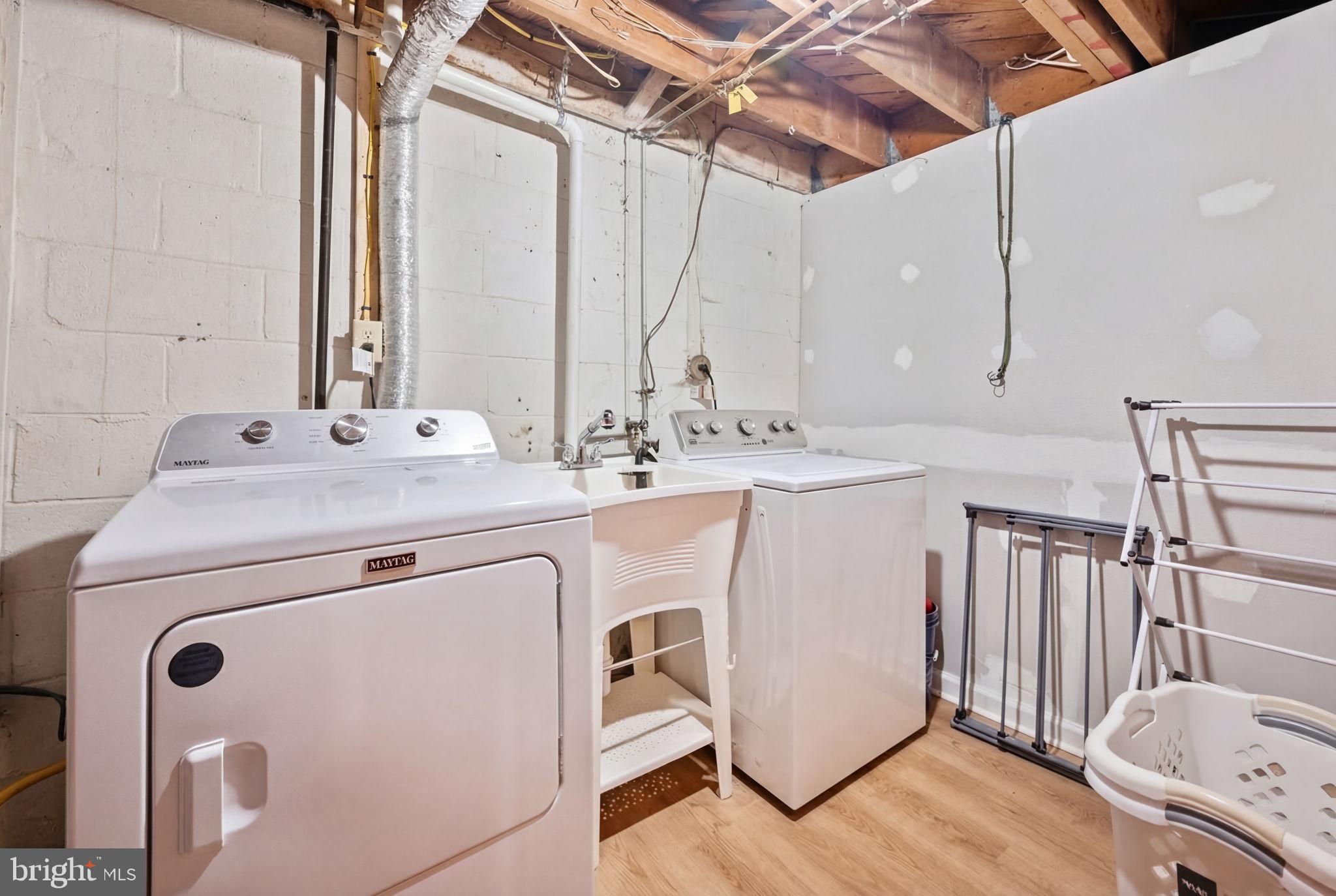 1311 Glenmont Road Baltimore, MD 21239 - Photo 31 of 49 Bright and functional laundry space.