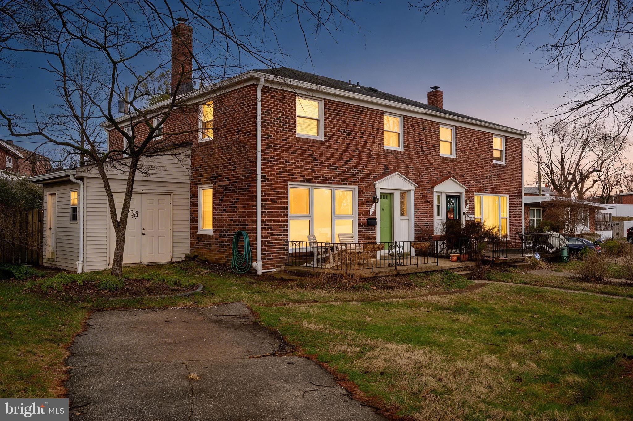 1311 Glenmont Road Baltimore, MD 21239 - Photo 37 of 49 Charming brick home at twilight glow.