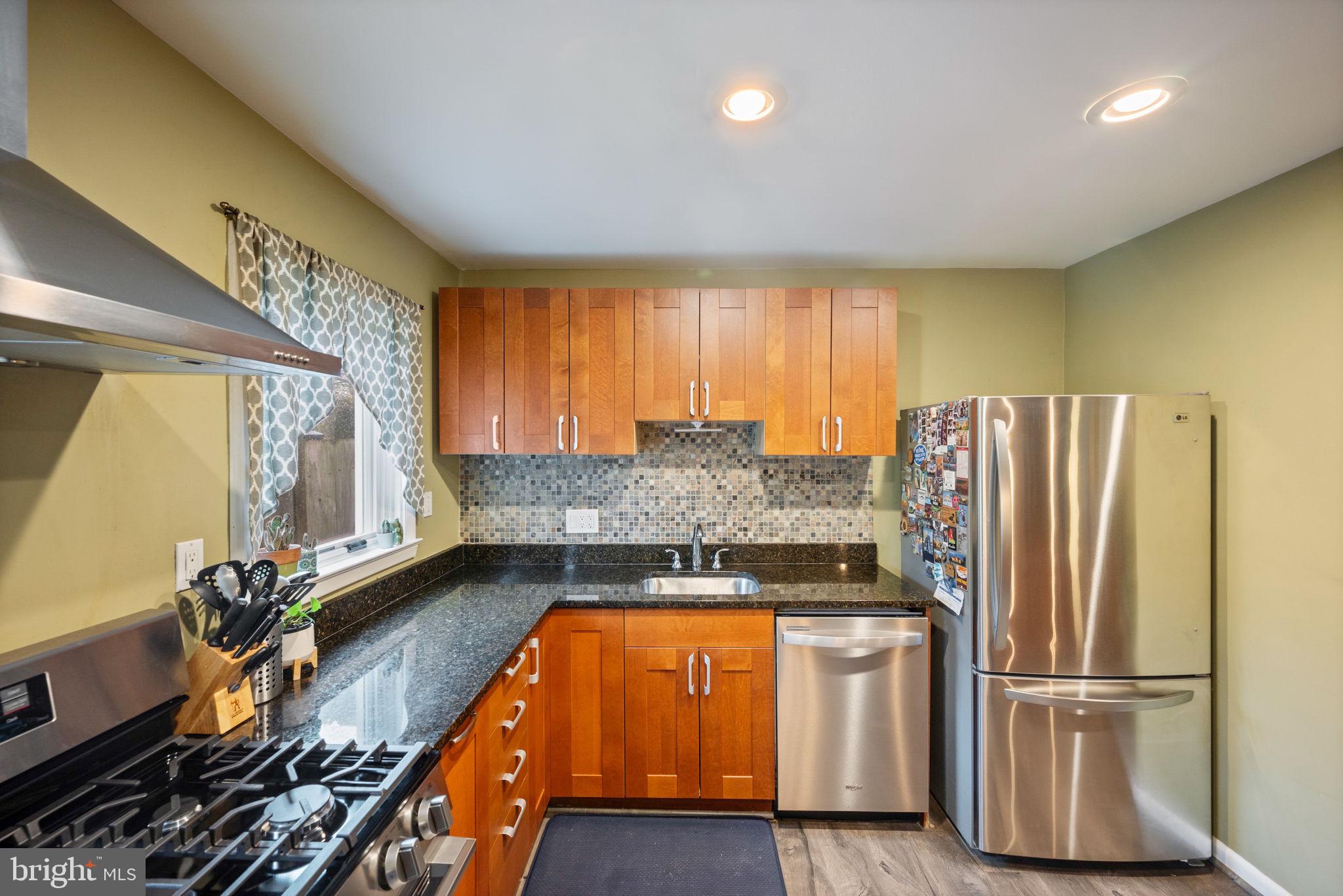 1311 Glenmont Road Baltimore, MD 21239 - Photo 10 of 49 Modern kitchen with sleek finishes.