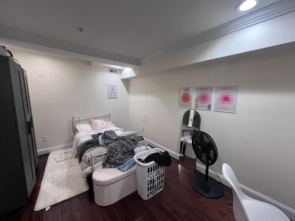 a workspace with furniture and wooden floor