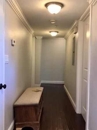 142 Centre Street, Unit 2 Boston, MA 02119 - Photo 5 of 9 a bathroom with a sink and a mirror