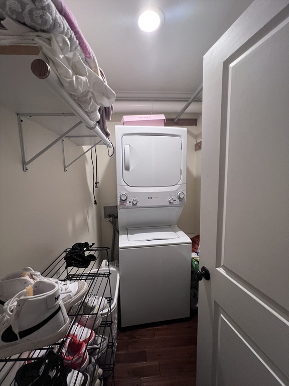 142 Centre Street, Unit 2 Boston, MA 02119 - Photo 9 of 9 a utility room with dryer and washer