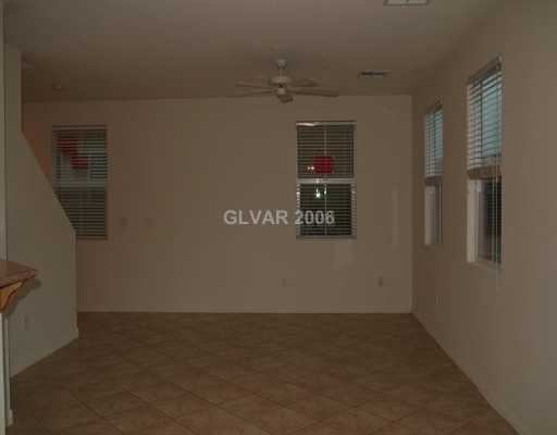 9128 Ripple Ridge Avenue, Unit 103 Las Vegas, NV 89149 - Photo 4 of 8 Den.